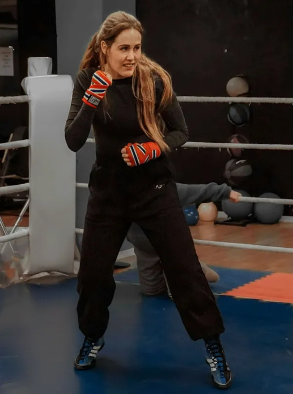 Trener i bokseringen under trening